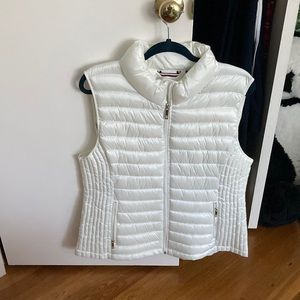 A white early winter and late fall vest. Never wore